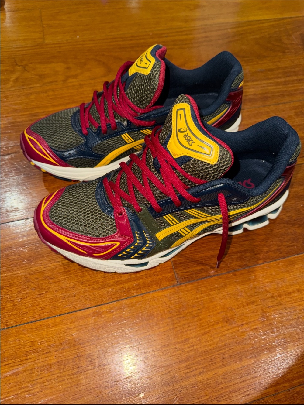 ASICS Olive Navy Running Shoes with Red Laces & Yellow Accents